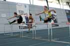 Oliver Whelans(Chester le Street) and Anthony Hogg (Jarrow) in a close finish under-17 60 metres hurdles.